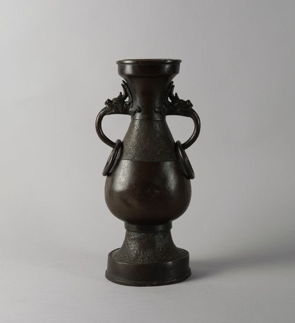 A TALL CHINESE BRONZE