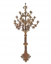 A TALL GILT-BRONZE STANDING CA