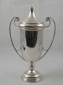 A tall hallmarked silver