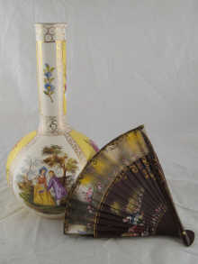 A tall onion shaped vase with