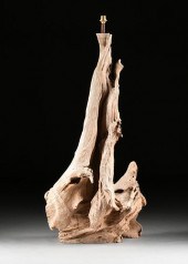 A TALL SOUTH-EAST ASIAN SCULPT