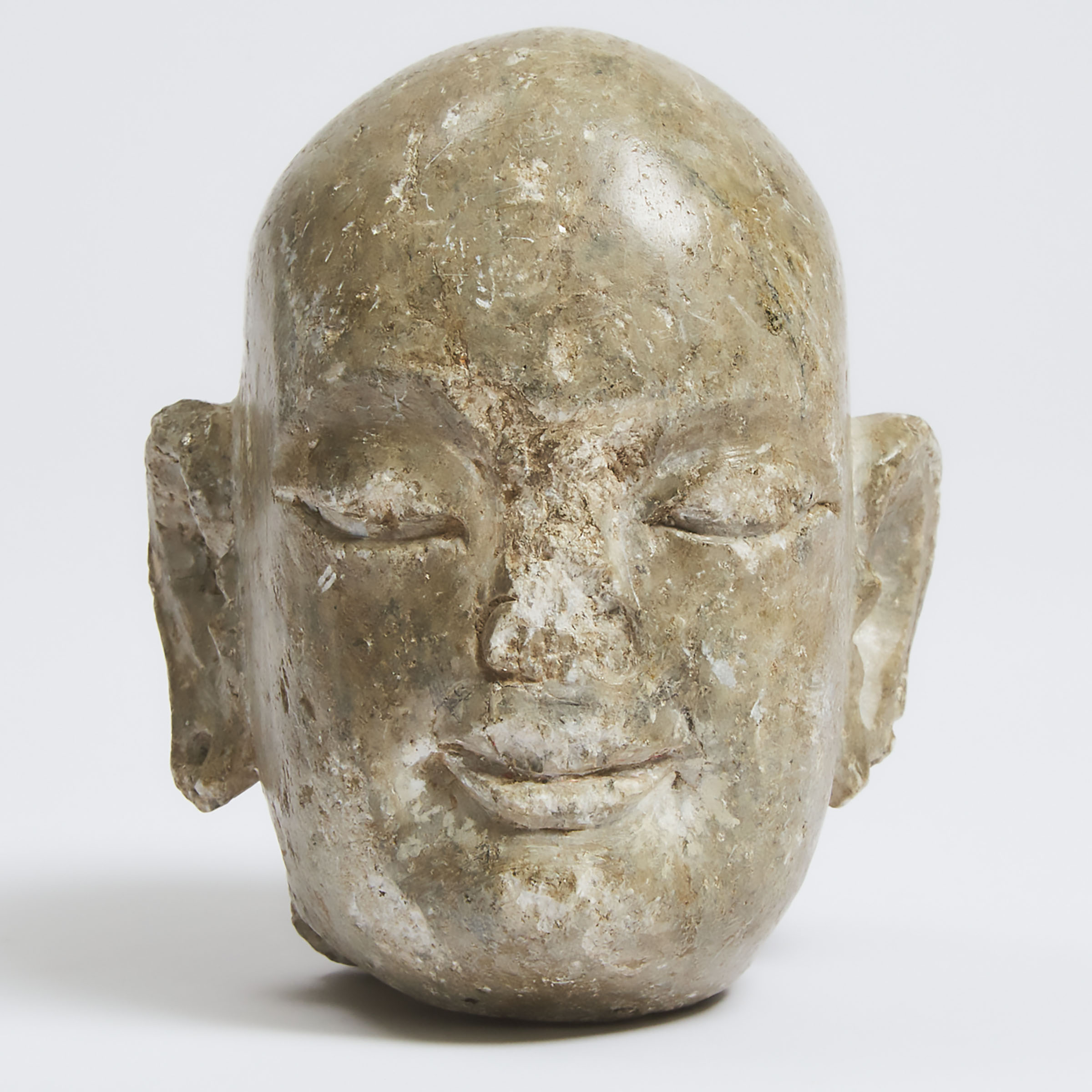 A Tang-Style Carved Limestone