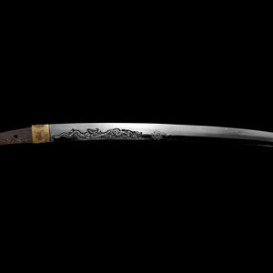 A Tanto in shirasaya with elaborate