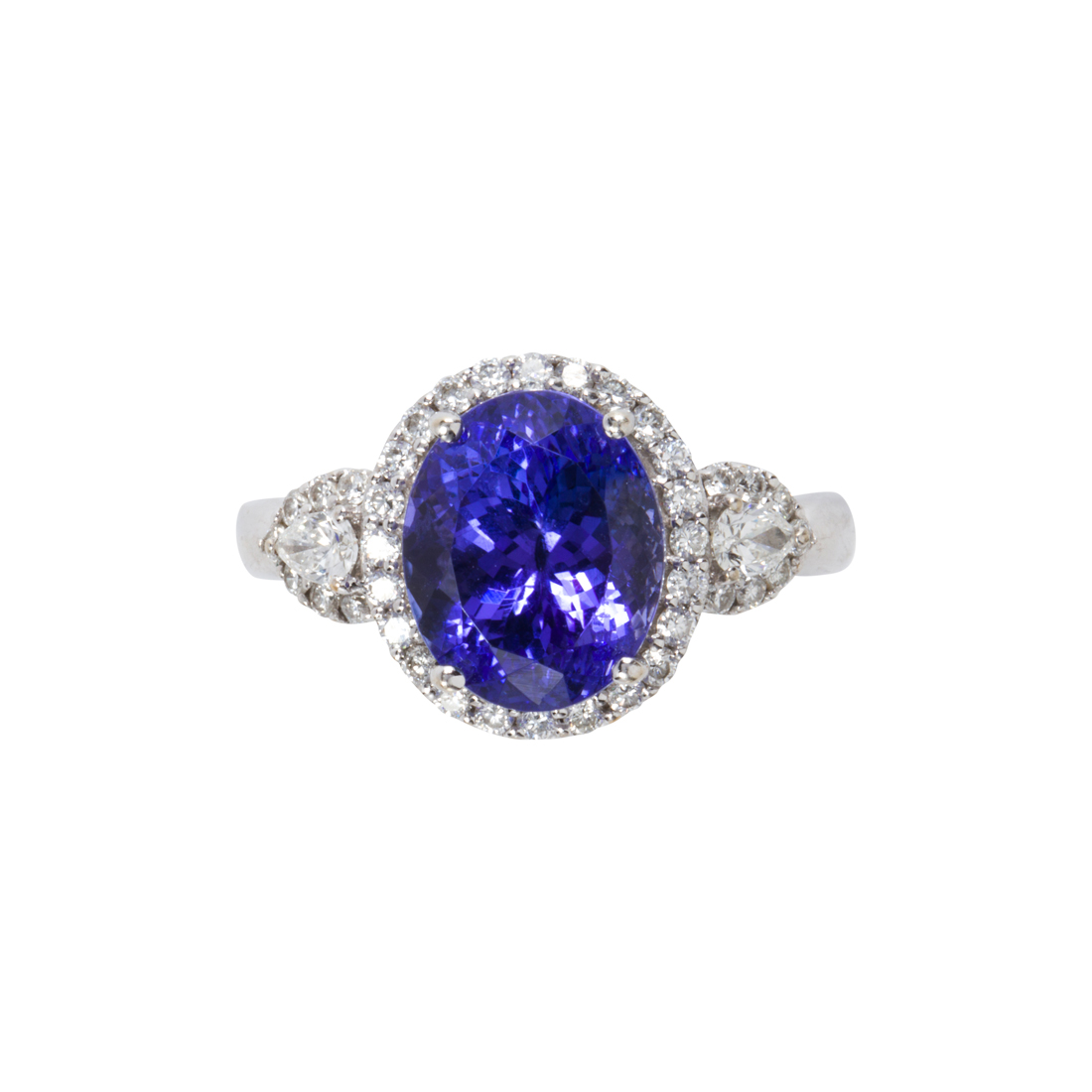 A TANZANITE, DIAMOND AND 18K