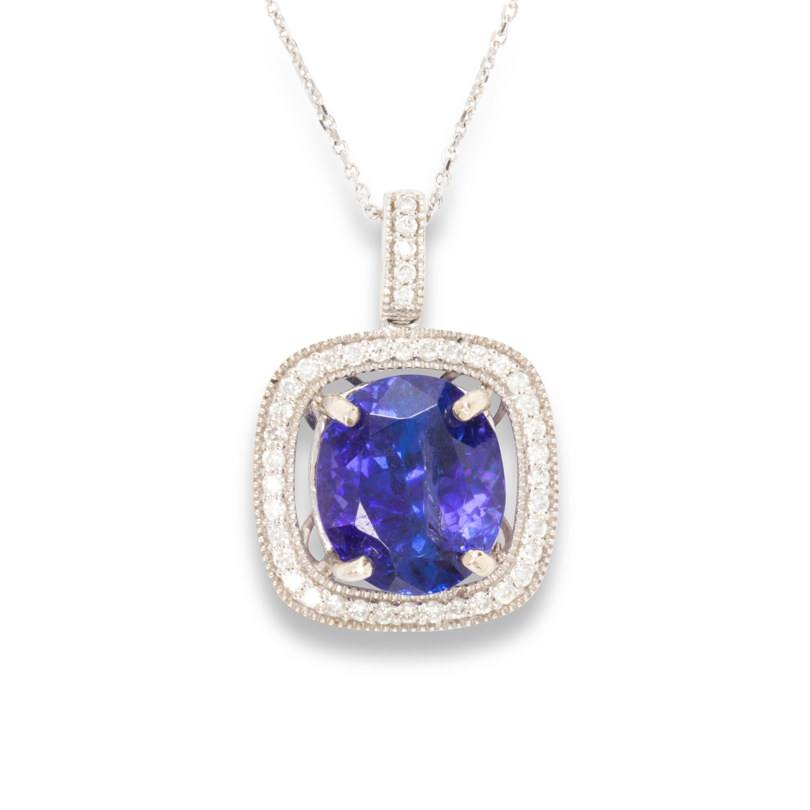 A TANZANITE, DIAMOND AND FOURTEEN