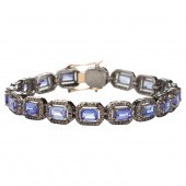 A TANZANITE, DIAMOND AND SILVE
