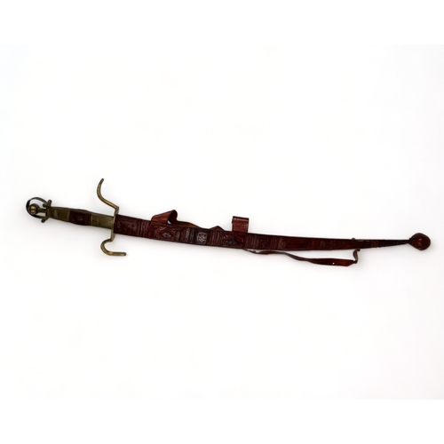 A Taureg / Berber carved sword &
