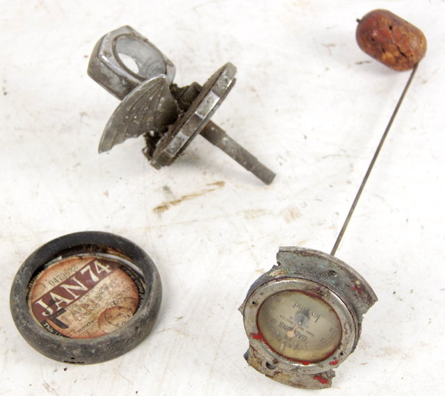 A tax disc holder a fuel gauge with