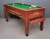 A teak framed bar billiards ta