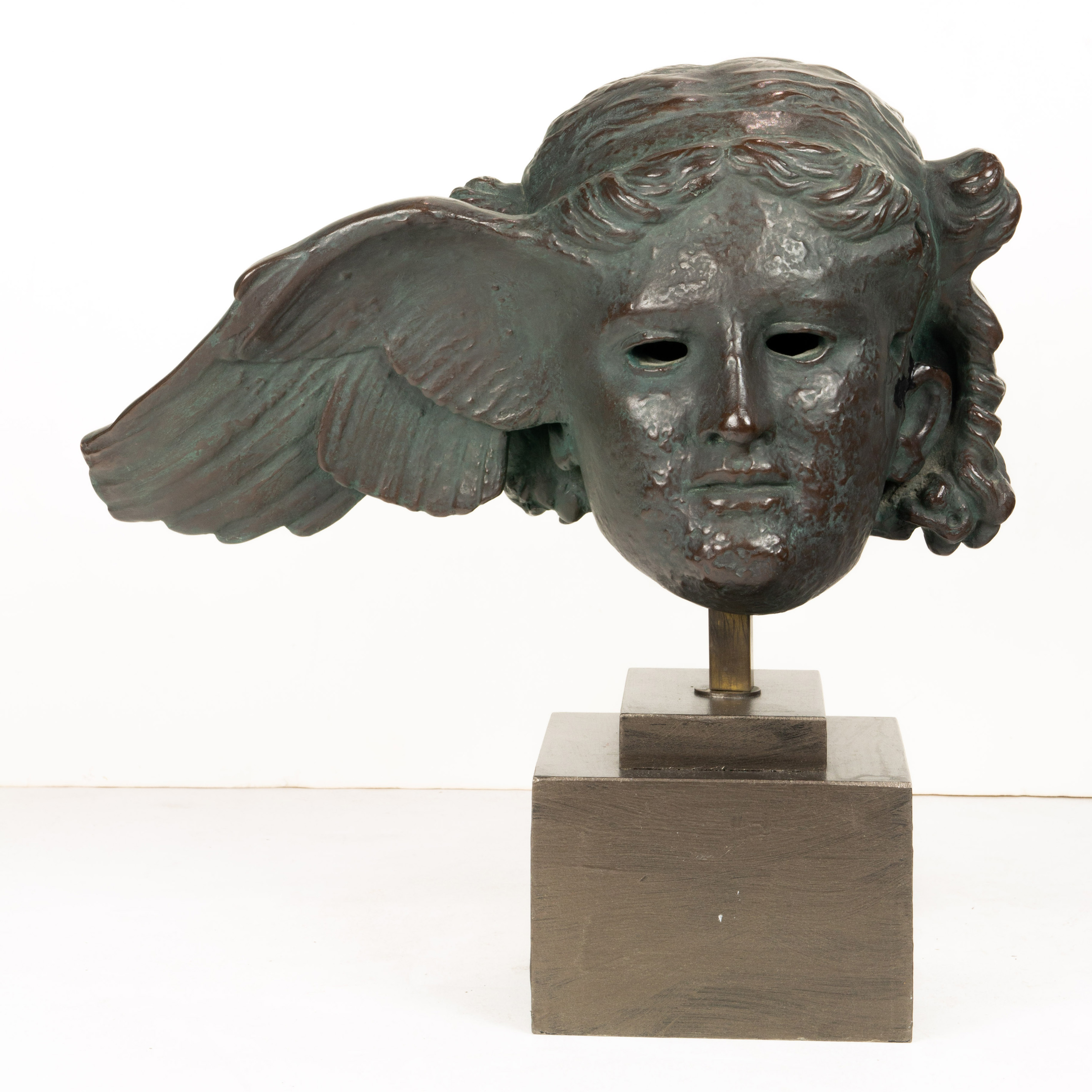 A TERRA COTTA SCULPTURE OF THE