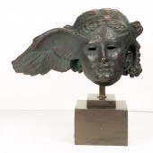 A TERRA COTTA SCULPTURE OF THE