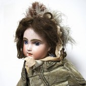 A TETE JUMEAU DOLL, WITH RED "