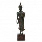 A THAI BRONZE WALKING BUDDHA S