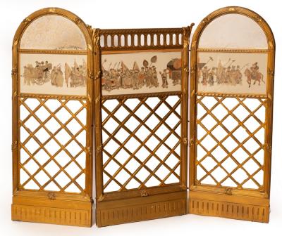 A three-fold gilt framed screen,