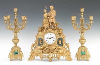 A Three Piece Clock Garniture Set