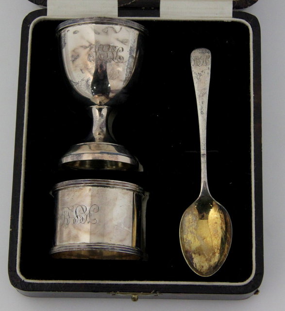 A three-piece silver christening