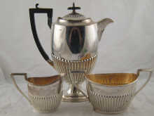 A three piece silver coffee set