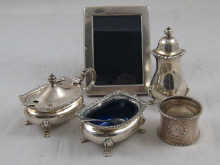 A three piece silver condiment