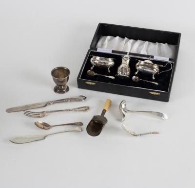 A three-piece silver cruet,