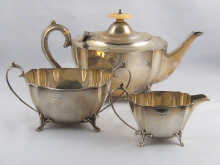 A three piece silver tea set