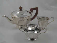 A three piece silver tea set by