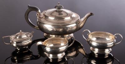 A three-piece silver tea set,