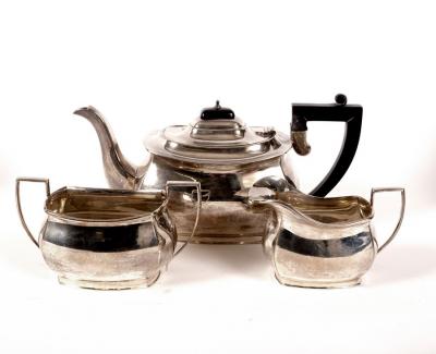 A three-piece silver tea set,
