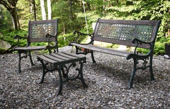 A three-piece vintage cast iron and