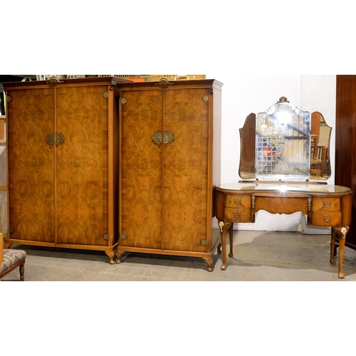A three-piece walnut bedroom suite,