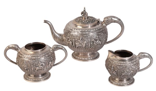 A THREE-PIECE WHITE METAL TEA