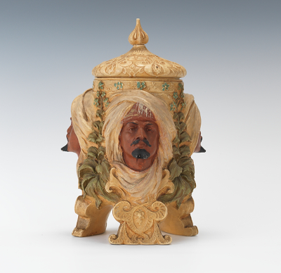 A Three Sided Arab Head Tobacco Jar