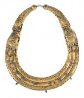 A TIBETAN BRASS CIRCULAR CEREM