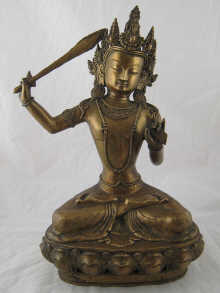 A Tibetan bronze Buddhist figure of