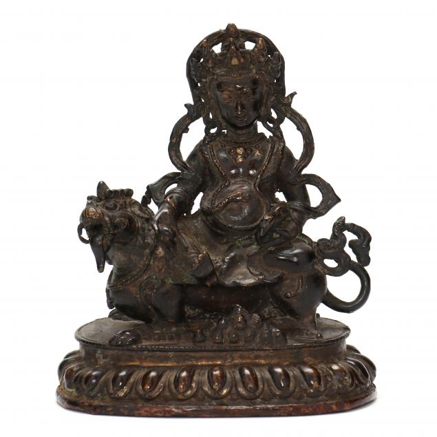 A TIBETAN BRONZE SCULPTURE OF