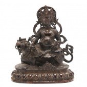 A TIBETAN BRONZE SCULPTURE OF