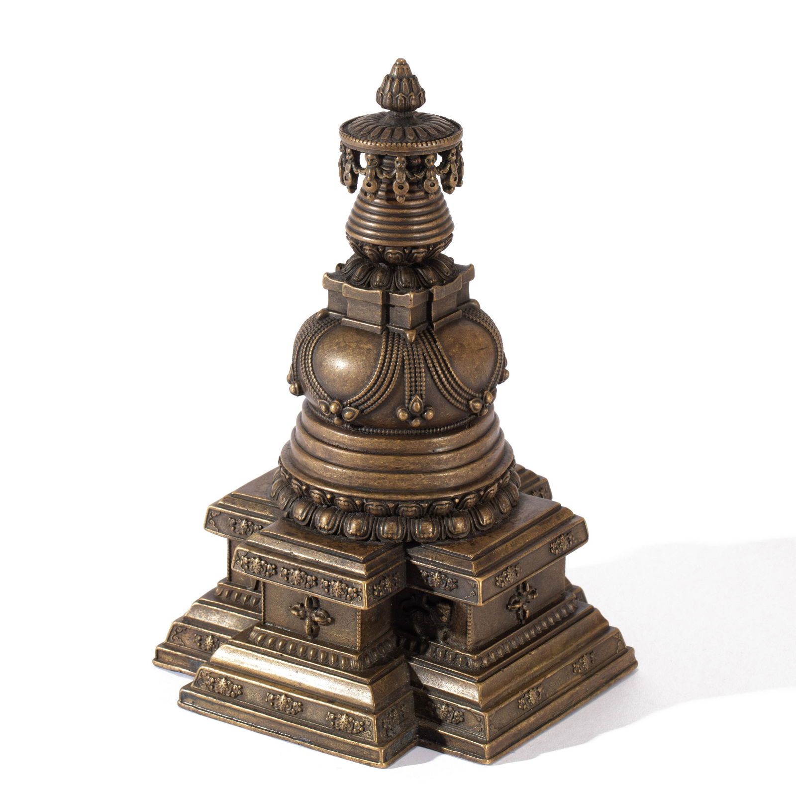 A TIBETAN BRONZE STUPAA TIBETAN