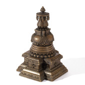 A TIBETAN BRONZE STUPA<br>A TI