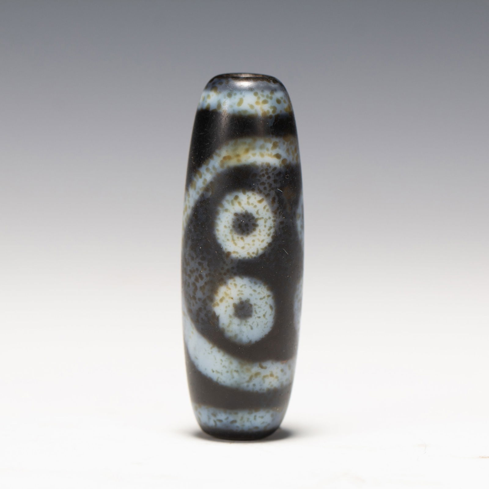 A TIBETAN DZI BEADA TIBETAN DZI