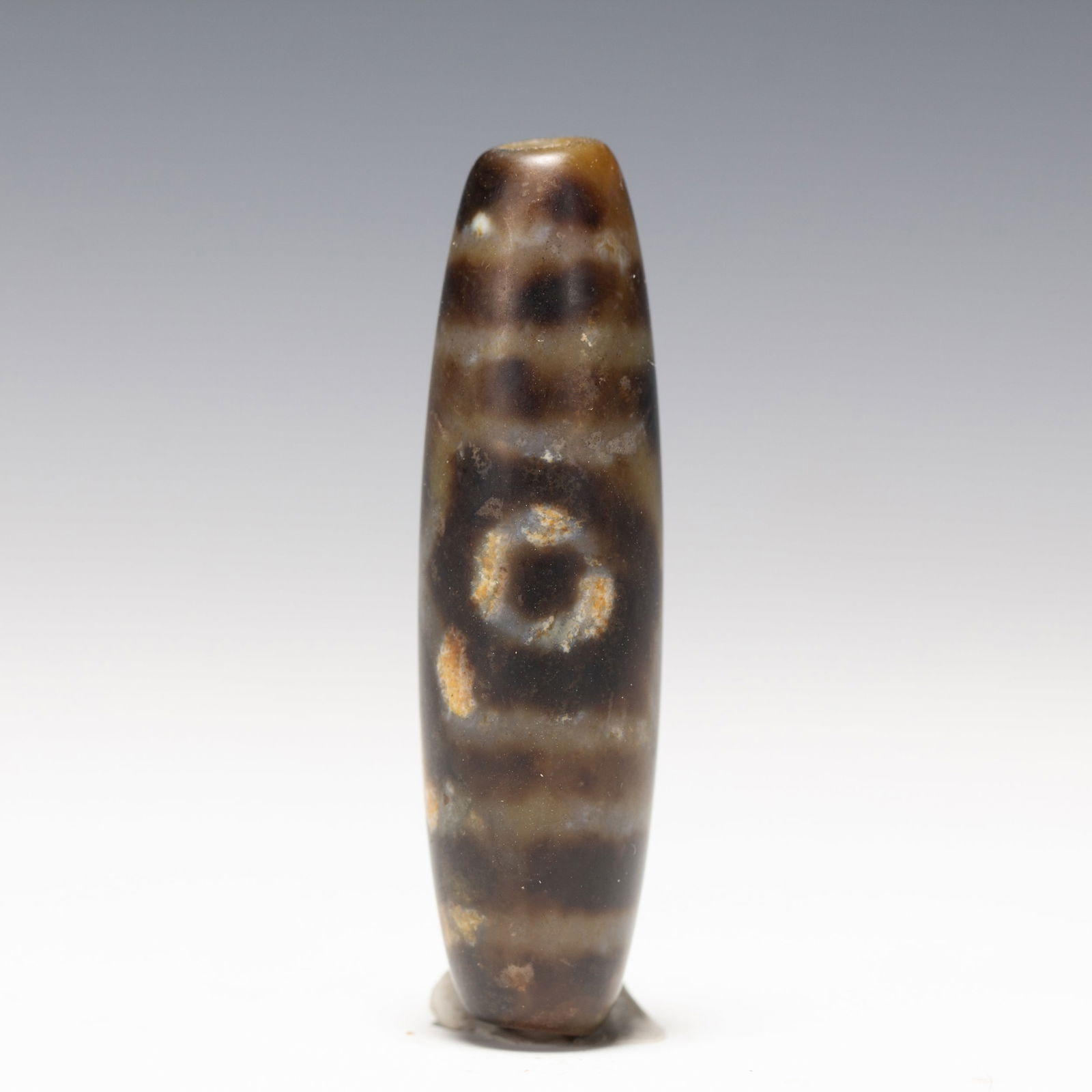 A TIBETAN DZI BEADA TIBETAN DZI
