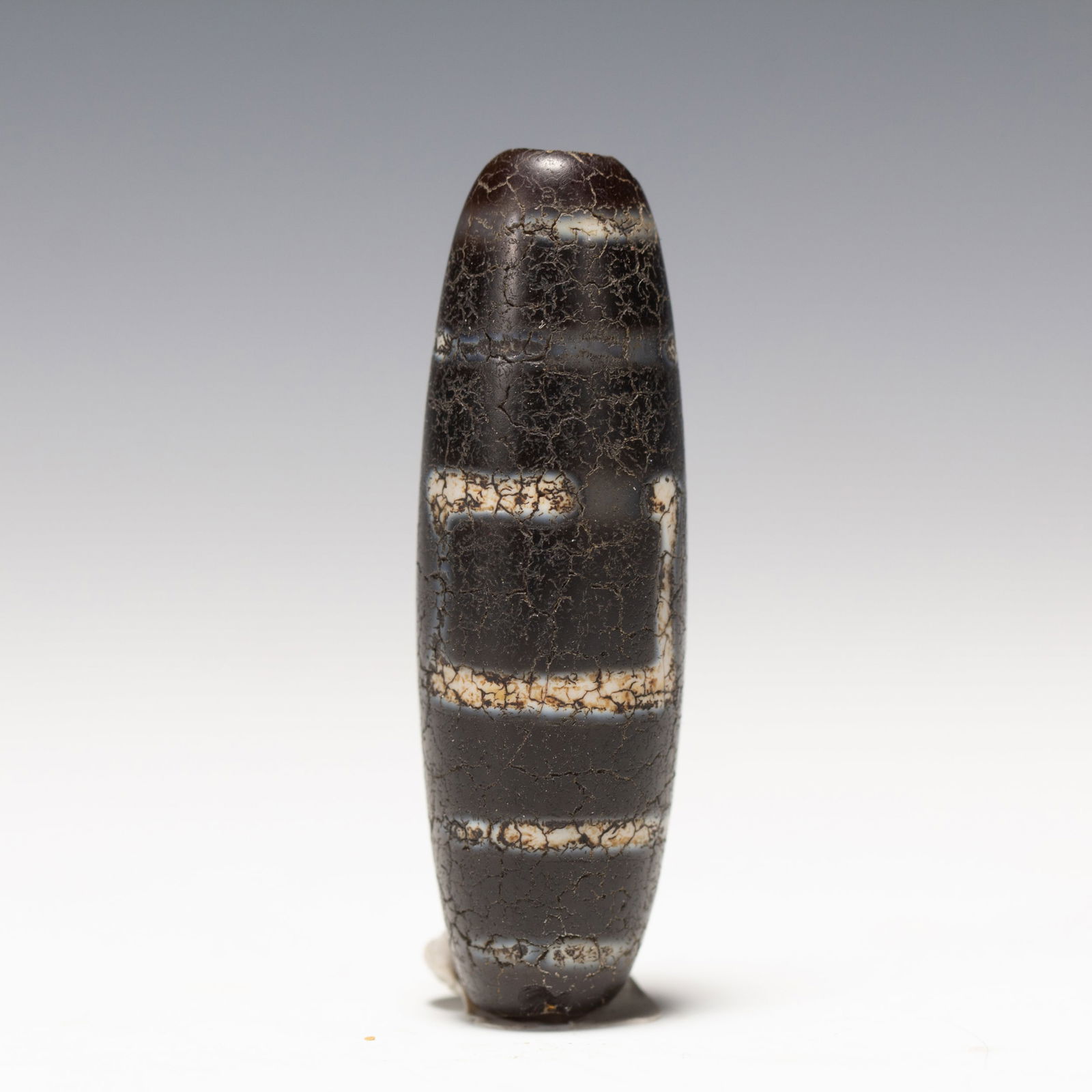 A TIBETAN DZI BEADA TIBETAN DZI