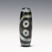 A TIBETAN DZI BEAD<br>A TIBETA
