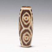 A TIBETAN DZI BEAD<br>A TIBETA