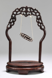 A TIBETAN DZI BEAD<br>A Tibeta