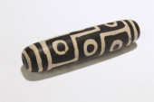 A TIBETAN DZI BEAD<br>A Tibeta