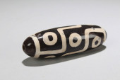 A TIBETAN FORTUNE DZI BEAD<br>