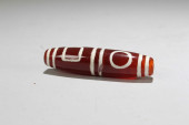 A TIBETAN FORTUNE DZI BEAD<br>