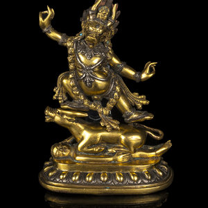A Tibetan Gilt Bronze and Silver