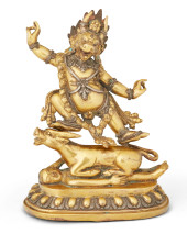 A TIBETAN GILT-BRONZE AND SILV