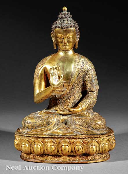 A Tibetan Gilt Bronze Figure of