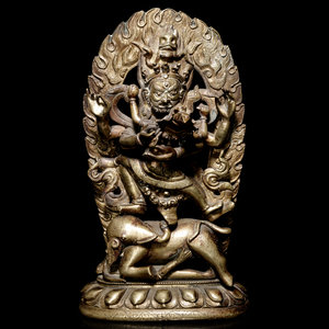 A Tibetan Gilt Bronze Figure of